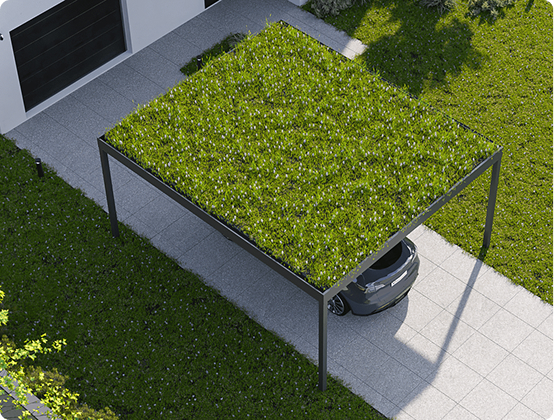 Carport mit grünem Dach in der Einfahrt eines modernen Hauses.